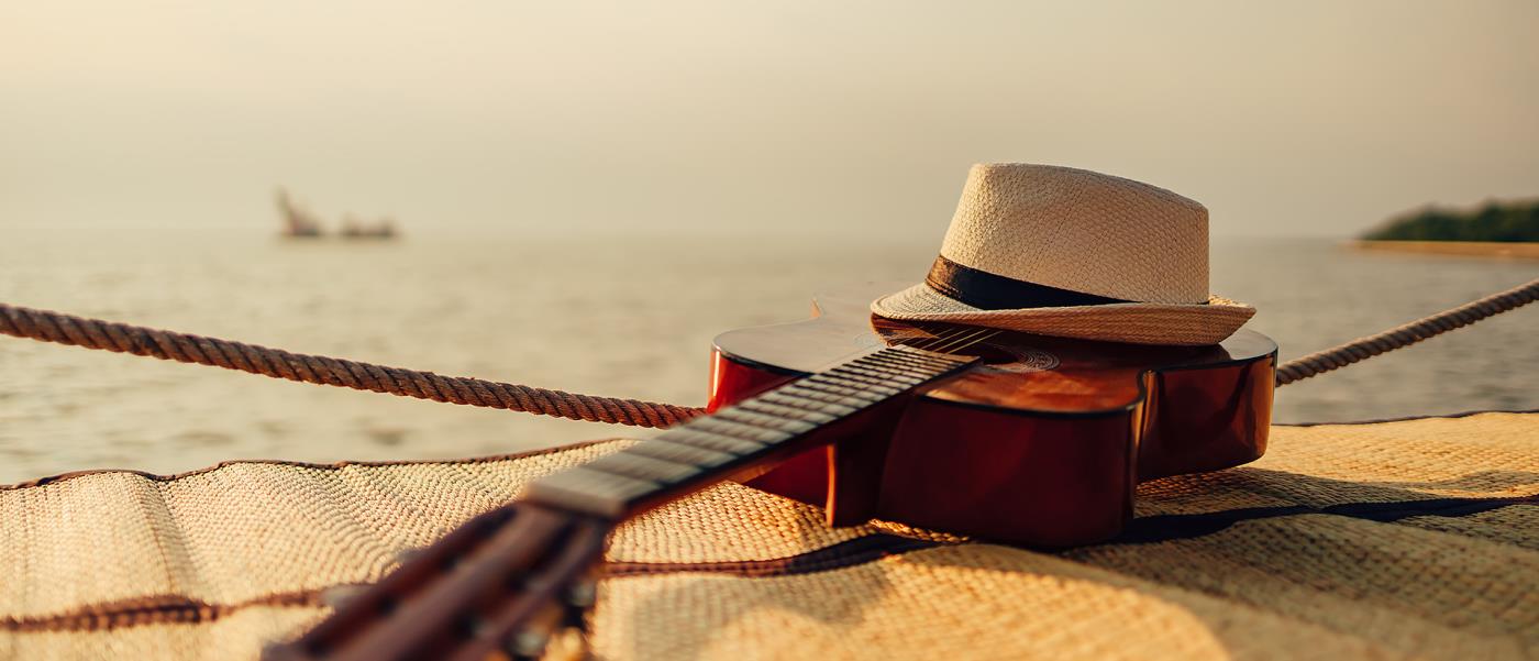 Strand, sol, gitarr