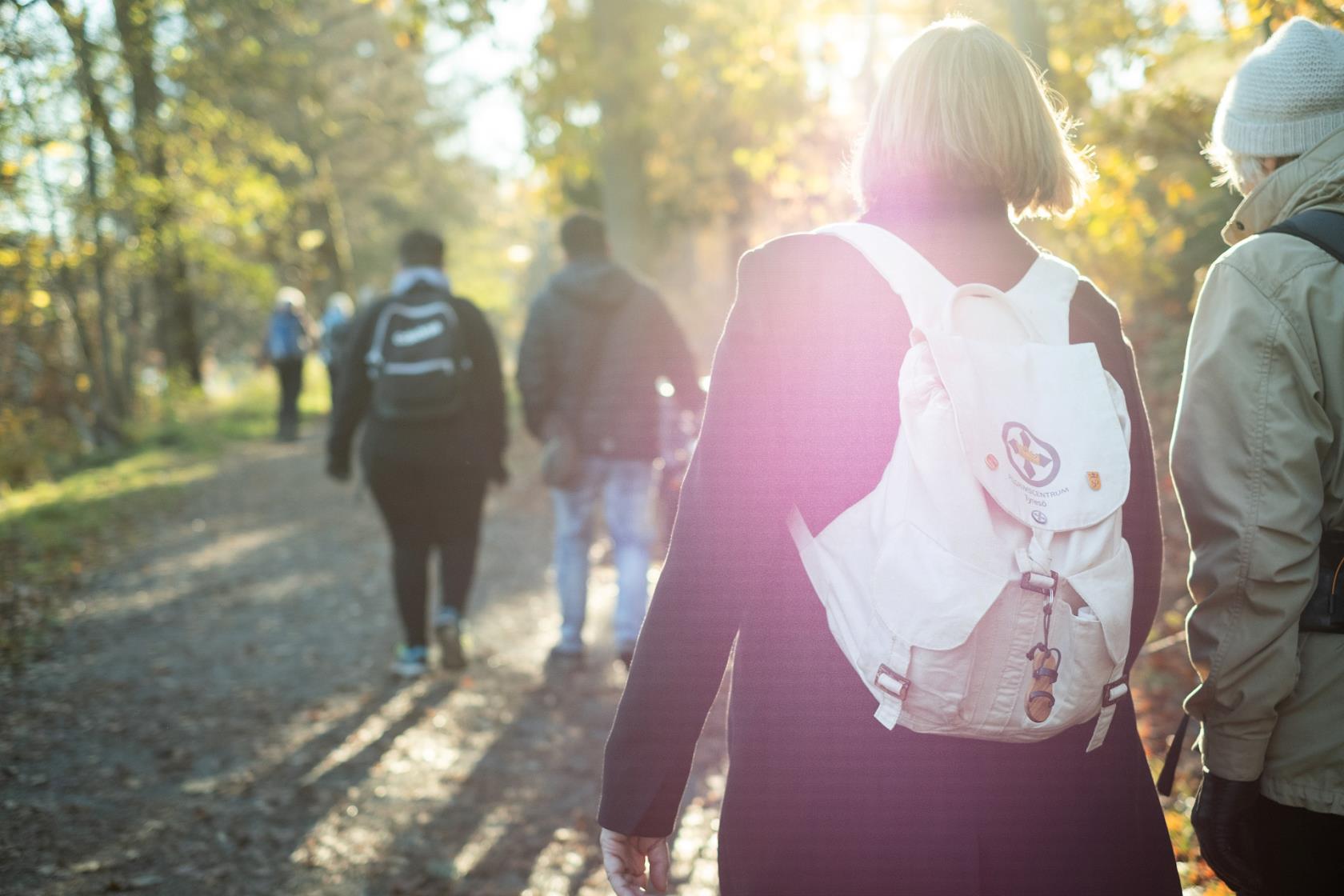 Personer på pilgrimsvandring