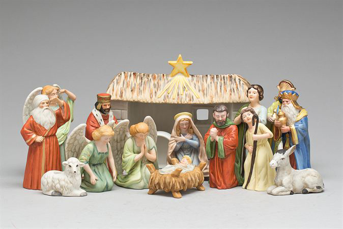 Josef och Maria  med Jesusbarnet i krubba